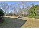 Large, level backyard offers plenty of room for recreation and relaxation at 4805 Mystere Sw Ln, Lilburn, GA 30047