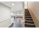 Finished basement with room for games and lounging, plus stairs to main level at 4805 Mystere Sw Ln, Lilburn, GA 30047