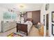 bedroom with ample natural light, chandelier, and fun decor at 4805 Mystere Sw Ln, Lilburn, GA 30047