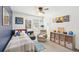 This bedroom has blue accent wall, organized toys, and organized books at 4805 Mystere Sw Ln, Lilburn, GA 30047