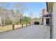 New deck features an open layout with views of the large, private yard at 4805 Mystere Sw Ln, Lilburn, GA 30047