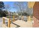 Wooden deck with chairs and a view of the backyard at 4805 Mystere Sw Ln, Lilburn, GA 30047