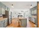 Spacious kitchen with hardwood floors, stainless steel appliances, and a large island at 4805 Mystere Sw Ln, Lilburn, GA 30047