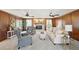 Elegant living room with a fireplace, comfortable seating, and wood accents at 4805 Mystere Sw Ln, Lilburn, GA 30047
