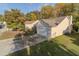 Lovely home exterior featuring an attached garage, spacious yard and driveway at 244 Amelia Garden Way, Lawrenceville, GA 30045