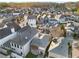 Overhead view of a residential neighborhood featuring various home styles and well-maintained landscapes at 322 Gray Shingle Ln, Woodstock, GA 30189