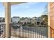 Neighborhood view from a private balcony in a walkable community at 322 Gray Shingle Ln, Woodstock, GA 30189