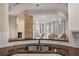 Kitchen area with granite counters, stainless steel sink and view of the living room area and fireplace at 322 Gray Shingle Ln, Woodstock, GA 30189