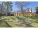 Spacious backyard featuring a shed and a privacy fence, perfect for outdoor activities at 361 Fountainmist Trl, Lawrenceville, GA 30043