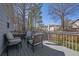 Back deck featuring outdoor seating and a view of the backyard at 361 Fountainmist Trl, Lawrenceville, GA 30043