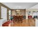 Inviting dining room with a large wooden table, perfect for Gathering gatherings and entertaining at 361 Fountainmist Trl, Lawrenceville, GA 30043