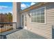 Close up of the second story deck and house siding with view to trees at 6279 Nellie Se Br, Mableton, GA 30126