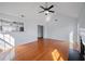 Bright living room with hardwood floors and an open view to the modern kitchen at 6279 Nellie Se Br, Mableton, GA 30126