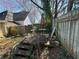 A deck in the backyard provides an inviting outdoor space for relaxation, needs renovation at 193 Berean Se Ave, Atlanta, GA 30316