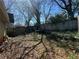 Leafy backyard with potential for landscaping and outdoor enjoyment, needs renovation at 193 Berean Se Ave, Atlanta, GA 30316