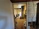 An incomplete interior space, revealing the structures of the house and a view of a yard at 193 Berean Se Ave, Atlanta, GA 30316