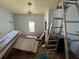 An incomplete room showcases renovation materials and a ladder, highlighting the project's progress at 193 Berean Se Ave, Atlanta, GA 30316