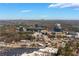 Skyline view of Atlanta over commercial buildings and parking areas with beautiful blue sky at 5043 Bell Dr, Smyrna, GA 30080