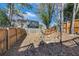 A spacious backyard with a wooden fence surrounding the property and greenery at 5043 Bell Dr, Smyrna, GA 30080