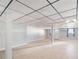 Large, finished basement with tile floors and neutral paint provides flexible living space at 5043 Bell Dr, Smyrna, GA 30080
