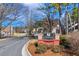 Afton Downs community entrance sign with a brick base, surrounded by lush landscaping in a desirable neighborhood at 5043 Bell Dr, Smyrna, GA 30080