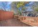 A spacious wooden deck overlooking the backyard and greenery at 5043 Bell Dr, Smyrna, GA 30080