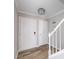 Entryway featuring wood floors, fresh paint, and a staircase to the second floor at 5043 Bell Dr, Smyrna, GA 30080