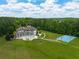 Extensive yard and home exterior feature pool, hot tub, and basketball court at 535 Waters Way, Fayetteville, GA 30215