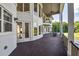 Large deck with outdoor seating area and views of the backyard and surrounding landscape at 535 Waters Way, Fayetteville, GA 30215