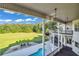 Expansive backyard with an in-ground pool, lush green lawn, and mature trees at 535 Waters Way, Fayetteville, GA 30215