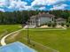 Aerial view of large landscaped property featuring a pool, gardens and basketball court at 535 Waters Way, Fayetteville, GA 30215