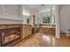 Luxury bathroom features a fireplace, vanity, and soaking tub at 535 Waters Way, Fayetteville, GA 30215