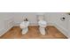 Bathroom featuring a bidet and a toilet with tiled floors at 535 Waters Way, Fayetteville, GA 30215