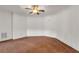 Large bedroom with neutral carpet, crown molding, and ceiling fan at 535 Waters Way, Fayetteville, GA 30215