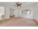Spacious bedroom with a large mirror above an arched opening at 535 Waters Way, Fayetteville, GA 30215