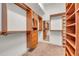 Walk-in closet with custom wood shelving and drawers for organized storage at 535 Waters Way, Fayetteville, GA 30215