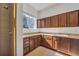 Laundry room with tile shower, ample cabinet space, and natural light at 535 Waters Way, Fayetteville, GA 30215