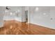 Living room with hardwood floors, white walls, recessed lighting, and a view of the outdoors at 535 Waters Way, Fayetteville, GA 30215