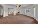 Open floor plan showcasing neutral walls, wide archways, and natural lighting at 535 Waters Way, Fayetteville, GA 30215