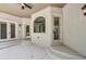 Outdoor patio area with multiple entry points and neutral-toned walls, ideal for relaxing and entertaining at 535 Waters Way, Fayetteville, GA 30215