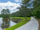 Scenic pathway along the serene waterfront at 535 Waters Way, Fayetteville, GA 30215