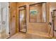 Elegant shower stall with a built-in bench and handheld shower fixtures at 535 Waters Way, Fayetteville, GA 30215