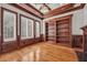 Beautiful home study with custom wood paneling, built-in shelving and hardwood flooring at 535 Waters Way, Fayetteville, GA 30215