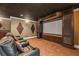 Home theater with theater seating and large projection screen at 535 Waters Way, Fayetteville, GA 30215