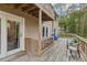 Backyard featuring a deck with chairs, a second story deck, and surrounded by trees at 1720 Little Willeo Rd, Marietta, GA 30068