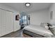 Bedroom featuring wood floors, ample closet space, and a serene atmosphere at 3355 Olivia Ct, Cumming, GA 30041