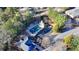 Aerial shot of community pool surrounded by trees, gazebos, and clubhouse at 3355 Olivia Ct, Cumming, GA 30041