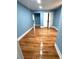 This bedroom features hardwood floors, neutral paint, and double doors at 356 Greenwood Nw Dr, Lilburn, GA 30047