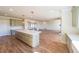 Spacious open floor plan featuring hardwood floors and modern finishes at 5410 Crow Dr, Cumming, GA 30041
