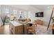 Bright living room with vaulted ceilings, large windows, and modern decor at 181 Arrowood Ln, Alpharetta, GA 30009